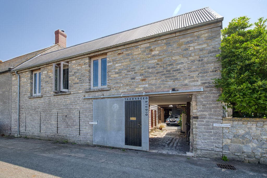 3 bedroom barn conversion for sale in A Beautifully Reimagined Somerset Barn with River Gardens and Far-Reaching Views Near Wells, BA5